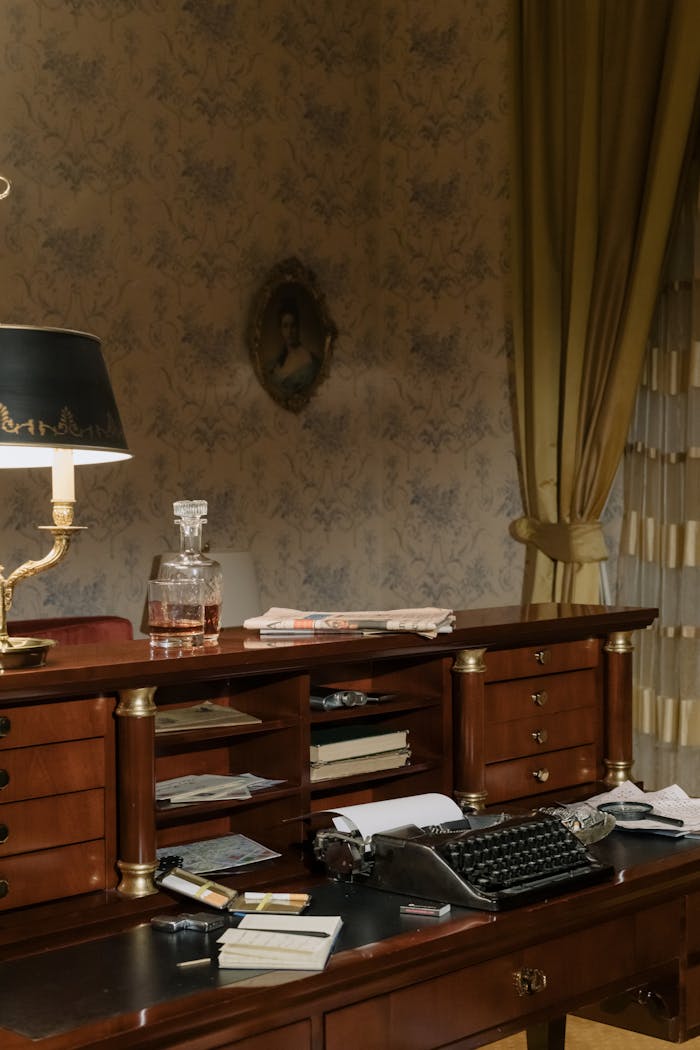 Classic vintage workspace featuring a typewriter and wooden furniture, evoking a 1950s retro ambiance.